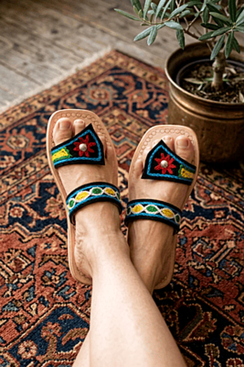 Woman wearing embroidered Chamba Chappal styled for a premium ethnic lifestyle look