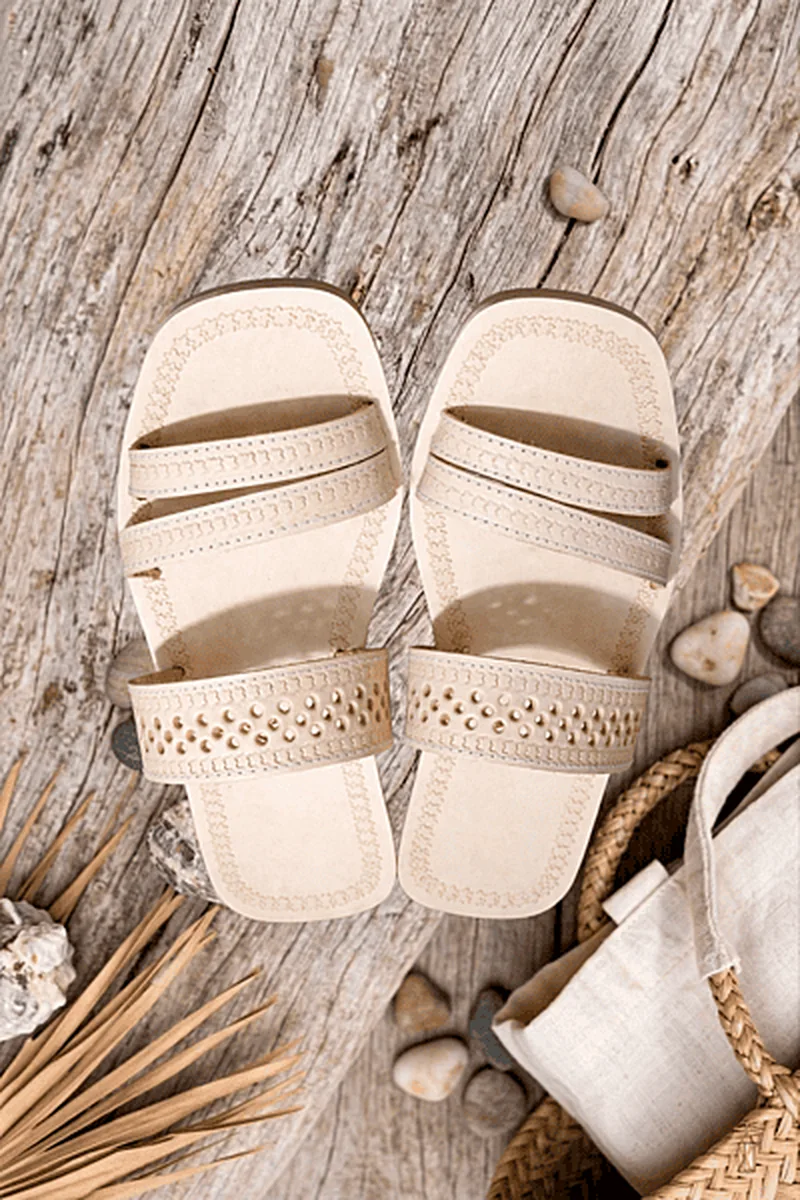 Close-up of cream handmade Chamba Chappal showing leather stitching and craft details